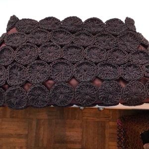 Brown knit clutch